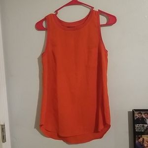 Red sleeveless shirt